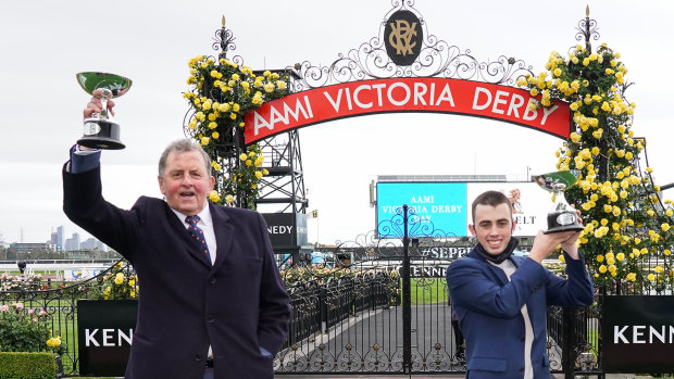 Denis Pagan, trainer of Johnny Get Angry, and jockey Lachlan King after winning the AAMI Victoria Derby at Flemington Racecourse on Saturday.
