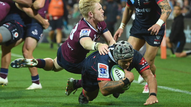 Tetera Faulkner scores the Rebels third try - and his third Super Rugby career try - on Friday night against Queensland.