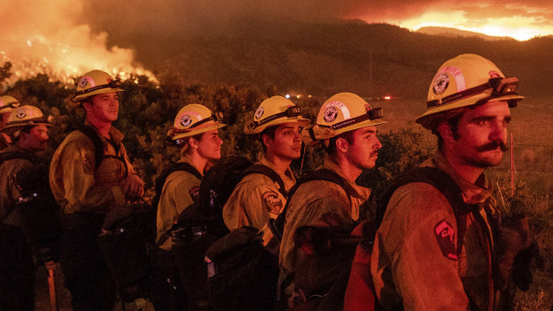 Firefighters monitor the Sugar Fire, part of the Beckwourth Complex Fire, in Doyle, California last week.