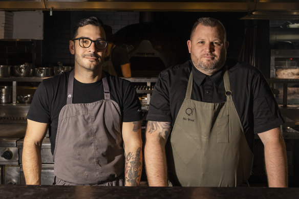 Santini head chef Dario Pompucci and QT Hotel culinary lead Nick Wood.