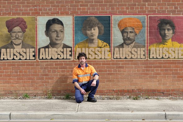 Artist Peter Drew in November with his “Aussie” posters, which have been misappropriated by a copycat. 