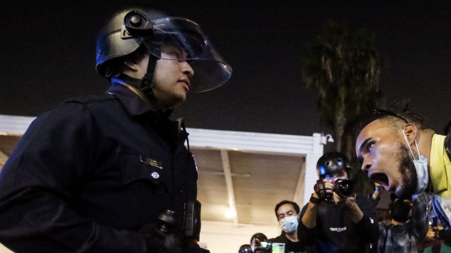 A menacing mood prevailed at the end of election day in Los Angeles as police confronted protesters.