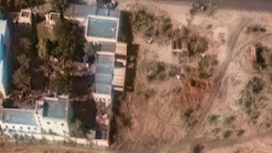 This satellite image from Vantor shows a trench experts suspect of being a mass grave in El Fasher.