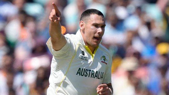 Scott Boland celebrates the wicket of Shubman Gill.