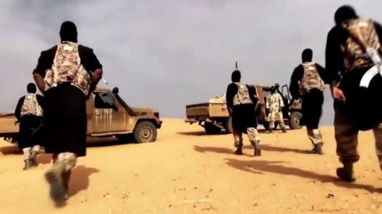 AQIM (Al-Qaeda in the Lands of the Islamic Maghreb)  fighters in a propaganda video, somewhere in the Sahara Desert in 2017.