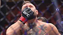 Conor McGregor reacts after his loss to Max Holloway.