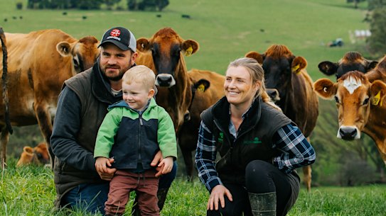 Tess Butler with her partner Ben and son Will (2 and 3/4 years old) on their dairy farm in AWest Gippsland, Victoria. 