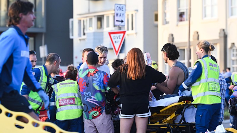 Police in Melbourne boost security as Hanukkah events cut short after Bondi massacre