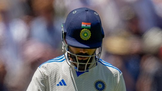 Virat Kohli departs the MCG on Monday, caught in the cordon again.