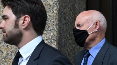 Former NSW minister Ian Macdonald (right) arriving at court with his barrister Jonathan Martin.