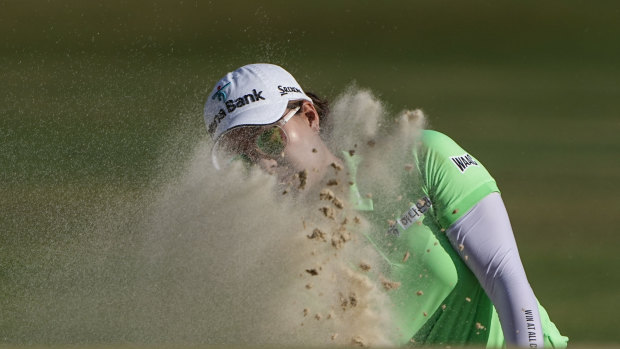 Minjee Lee plays out of the bunker.
