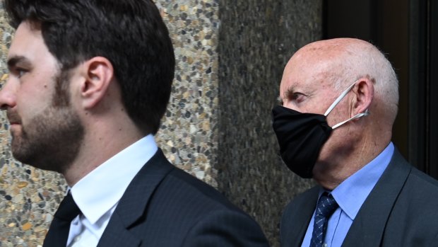 Former NSW minister Ian Macdonald (right) arriving at court with his barrister Jonathan Martin.