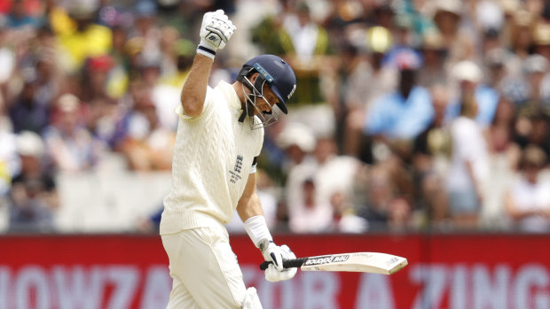 England captain Joe Root punches the air in frustration. 