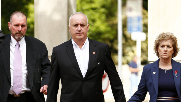 Grace's parents David and Gillian Millane arrive with Detective Inspector Scott Beard, left, at the Auckland High Court for a previous hearing.