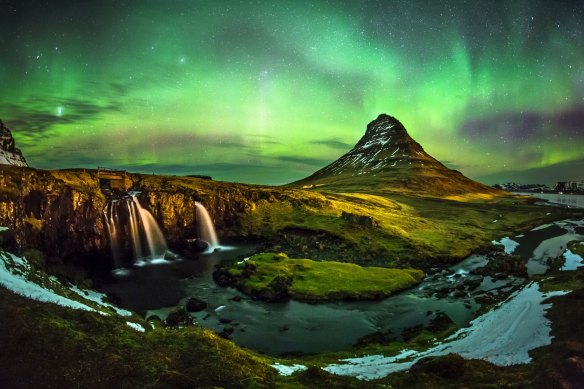 Aurora borealis at Mount Kirkjufell, Iceland.