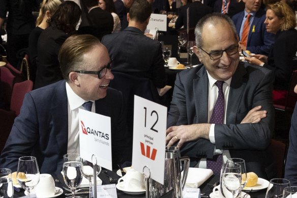 Alan Joyce (left) and Mike Pezzullo  at a speech by Treasurer Jim Chalmers at Parliament House in May.