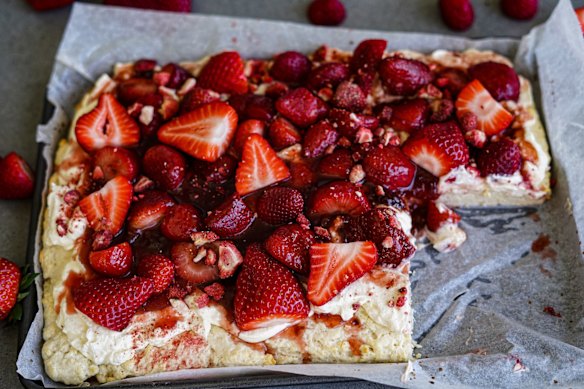 Lemonade scone slab with strawberry jam, cream and fresh strawberries.