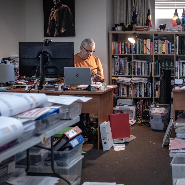Ken Wyatt in his study surrounded by “native welfare” files. Spanning a century, they show in painful detail how cruel policies affected four generations of his family.