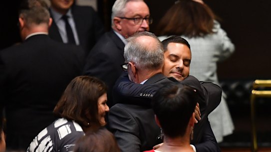 Alex Greenwich is congratulated by his parliamentary supporters following the successful passage of the bill.