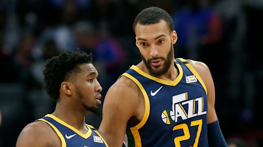 Rudy Gobert (right) has pledged a donation of more than $US500,000 to help various groups affected by the coronavirus pandemic.