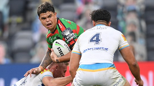 Latrell Mitchell is tackled by Tanah Boyd.