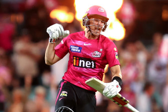 Sean Abbott celebrates after hitting the winning run.