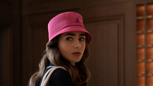 Emily wears a bucket hat with a complete lack of irony.