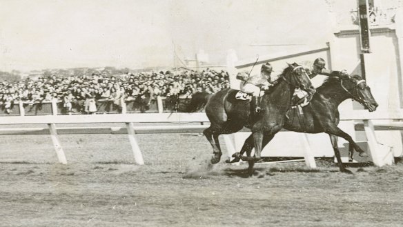 Rimfire ridden by Ray Neville, outside, wins the 1948 Melbourne Cup.