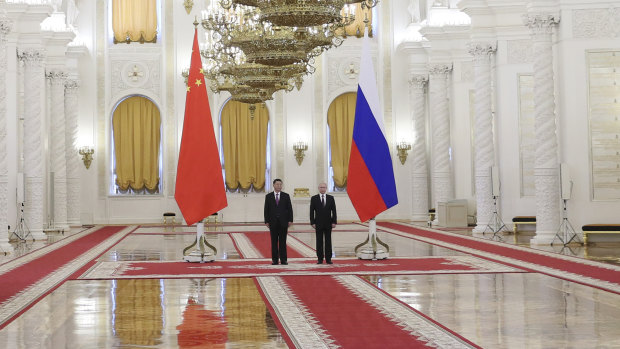 Grand vision: Russian President Vladimir Putin with his Chinese counterpart Xi Jinping in the Kremlin on Wednesday.  Xi Jinping is also expected to attend the St Petersburg conference.