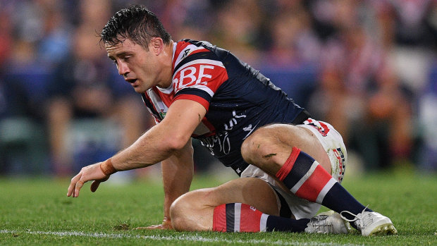 Battling: Cooper Cronk was in immense pain last weekend and is unlikely to play on Sunday.