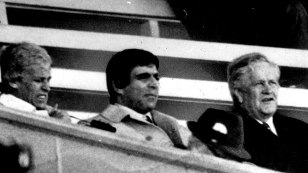 The 1977 photograph that dogged Chief Stipendiary Magistrate Murray Farquhar for years shows him (far right) at the races with Dr Nick Paltos (later sentenced for drug importations) and crime boss George Freeman (far left.)