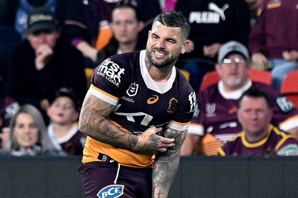Adam Reynolds grabs his arm in a worrying sign for the Broncos.