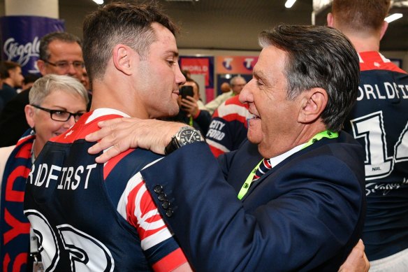 Roosters supremo Nick Politis, with Cooper Cronk after last year's grand final win, believes points so far this season should be scrapped.