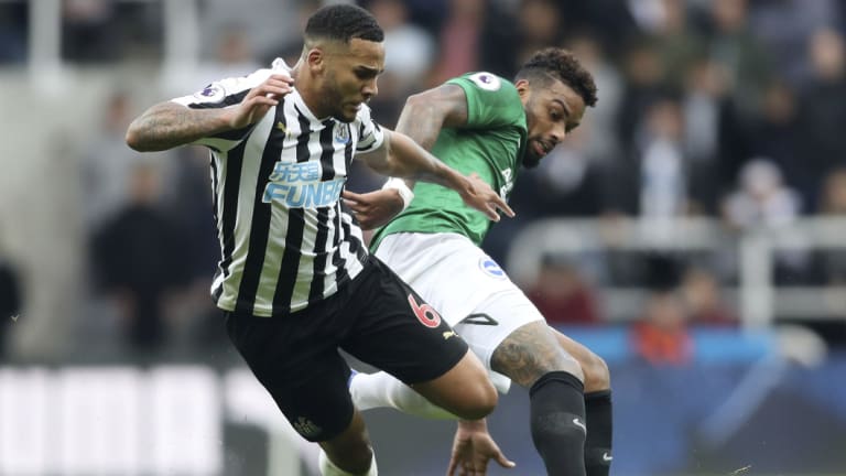 Newcastle's Jamaal Lascelles (left) has called for club unity.