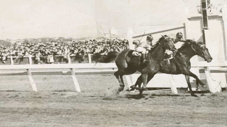 Rimfire ridden by Ray Neville, outside, wins the 1948 Melbourne Cup.