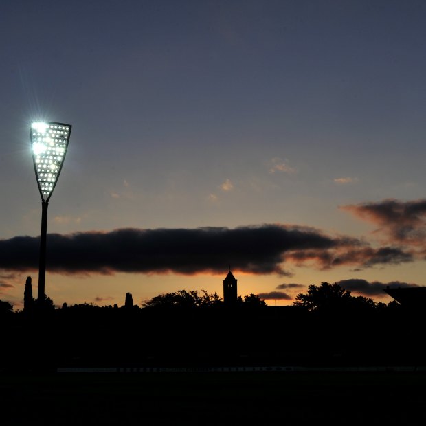 Manuka Oval's lights being turned on for the first time.