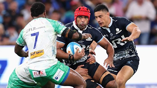 Langi Gleeson carts the ball up against the Fijian Drua.