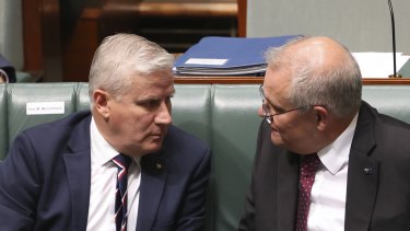 Deputy Prime Minister Michael McCormack and Prime Minister Scott Morrison during Question Time at Parliament House in Canberra on Tuesday 23 March 2021
