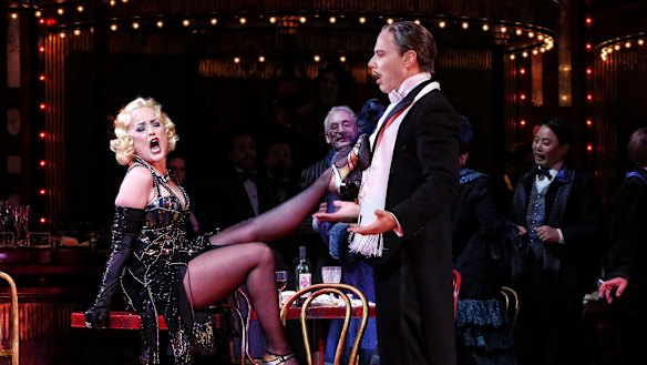 Rehearsals on hold: the late Taryn Fiebig as Musetta opposite  Adrian Tamburini as Alcindoro in an earlier production of Opera Australia’s La Boheme.