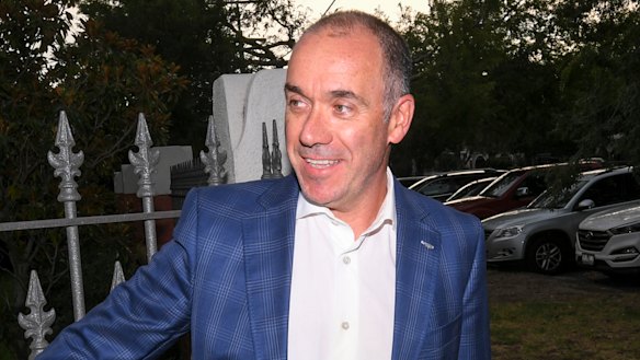 Outgoing National Australia Bank CEO Andrew Thorburn speaks to the media outside his home on Thursday. 