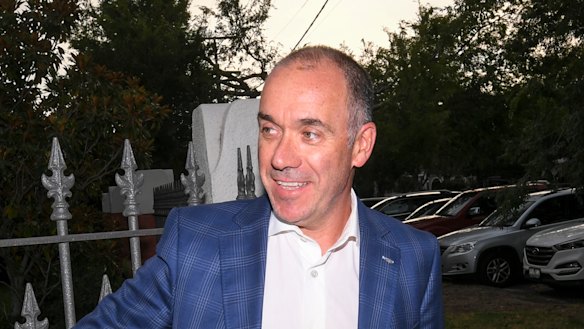 Outgoing National Australia Bank CEO Andrew Thorburn speaks to media outside his home on Thursday. 