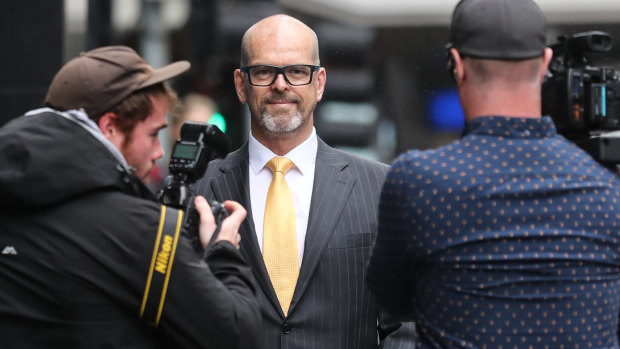 For police commissioner Simon Overland arrives at the royal commission on Monday.