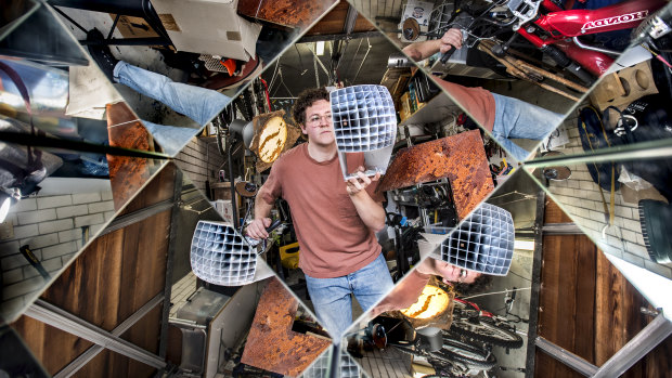 Artist Joel Adler with a model of the sculpture that will be part of this year’s Sculpture by the Sea.