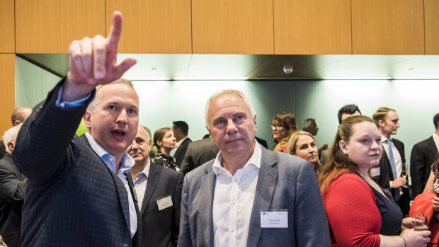 Booktopia CEO Tony Nash (right) with the ASX's James Posnett.