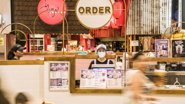 Cloris Jiang waits to serve customers at the Koomi yoghurt drink outlet at the Macquarie Centre.