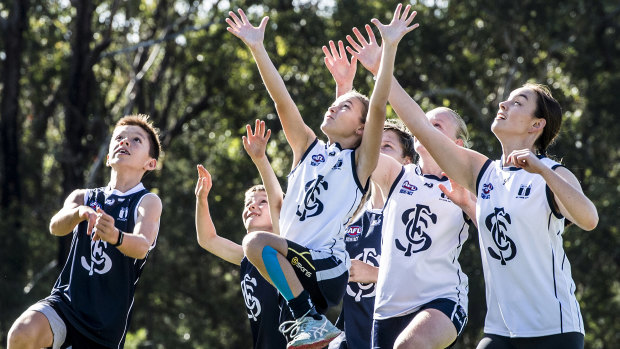 St Ives junior AFL players during their pre-season in February just before the coronavirus bans kicked in.