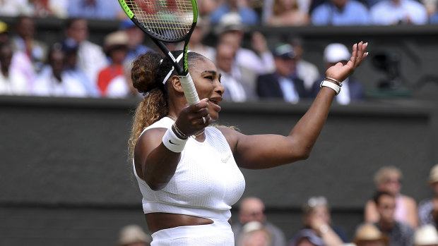 Serena Williams gestures after losing a point.