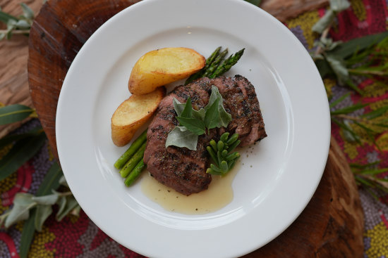 Mark Olive’s slow-cooked river mint lamb with desert lime glaze, roasted kipfler potato and charred asparagus.