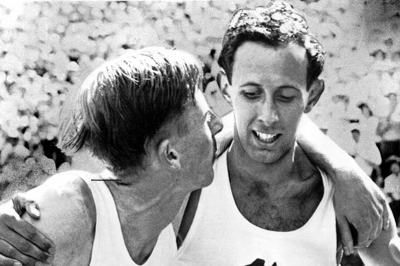 John Landy (right) and Dr Roger Bannister after they finished in the mile run of British Empire Games, in Vancouver.