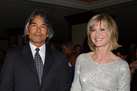 Olivia Newton-John, right, with Patrick McDermott, who authorities believe disappeared at sea